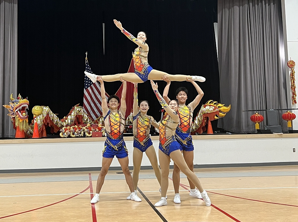 Members of an art troupe from the High School Affiliated to Renmin University of China perform aerobics at the auditorium of the International Studies Learning Center in South Gate, Southern California, the United States, on February 5, 2024. /CFP