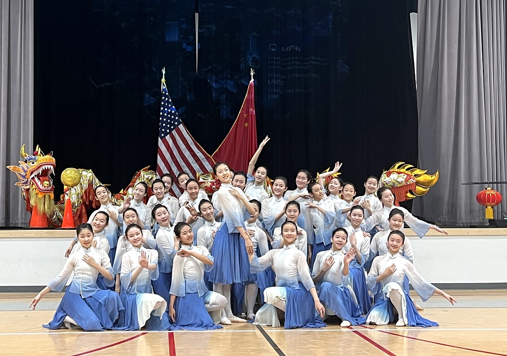 Members of an art troupe from the High School Affiliated to Renmin University of China perform a dance at the auditorium of the International Studies Learning Center in South Gate, Southern California, the United States, on February 5, 2024. /CFP