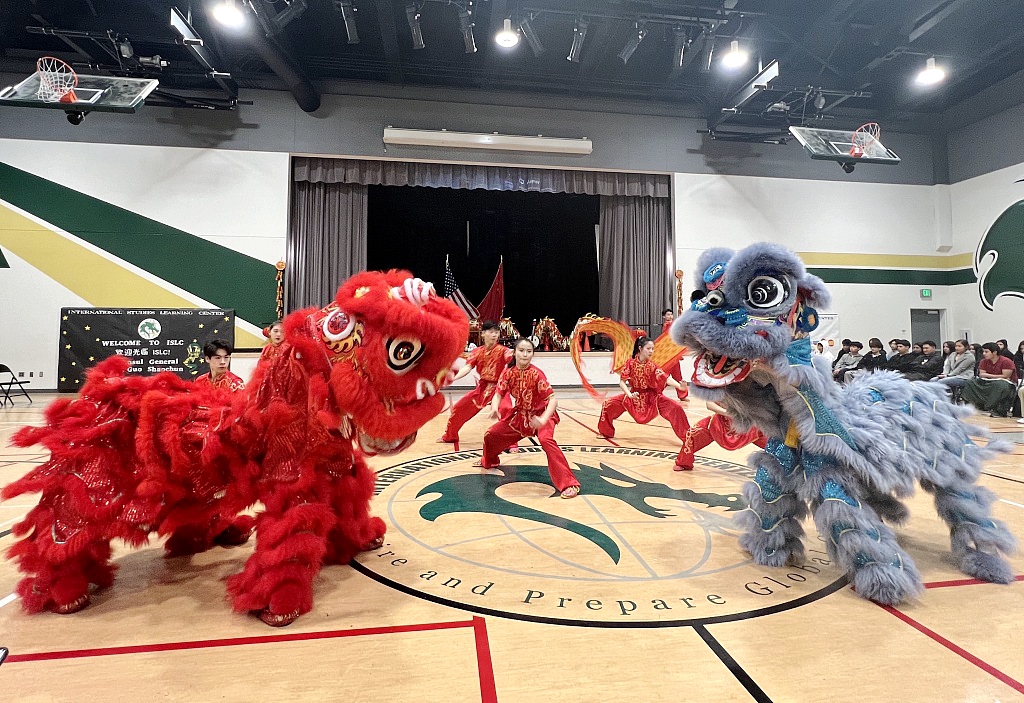Members of an art troupe from the High School Affiliated to Renmin University of China stage a martial arts and lion dance performance at the auditorium of the International Studies Learning Center in South Gate, Southern California, the United States, on February 5, 2024. /CFP