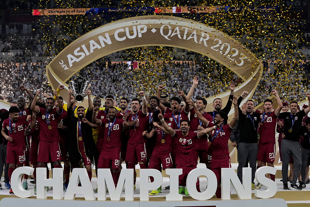 Qatar's players celebrate after winning the AFC Qatar 2023 Asian Cup title at the Lusail Stadium in Doha, Qatar, February 10, 2024. /CFP