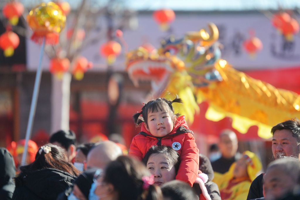 Visitors attend the temple fair at Yaji Mountain in the Pinggu District of Beijing on February 10, 2024, Chinese New Year's Day. /CFP