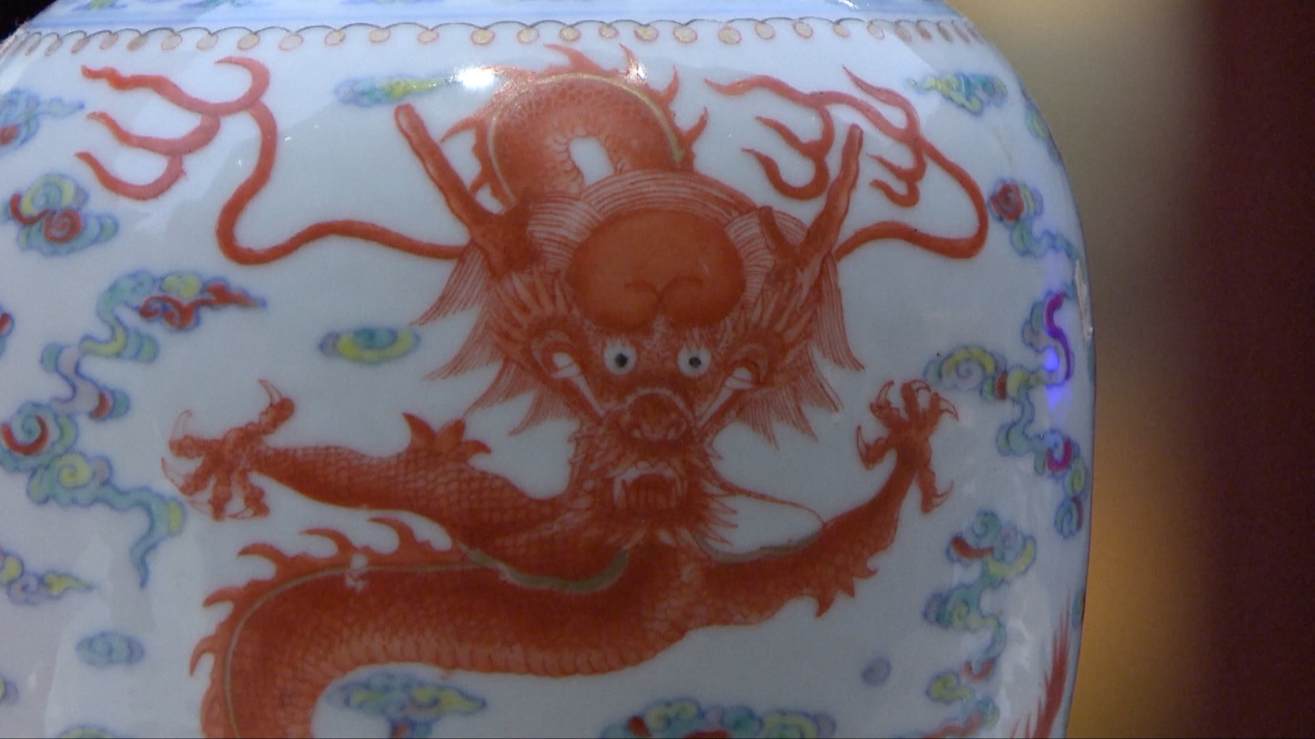 Dragon patterns on porcelain on display at the National Museum of China. / CGTN