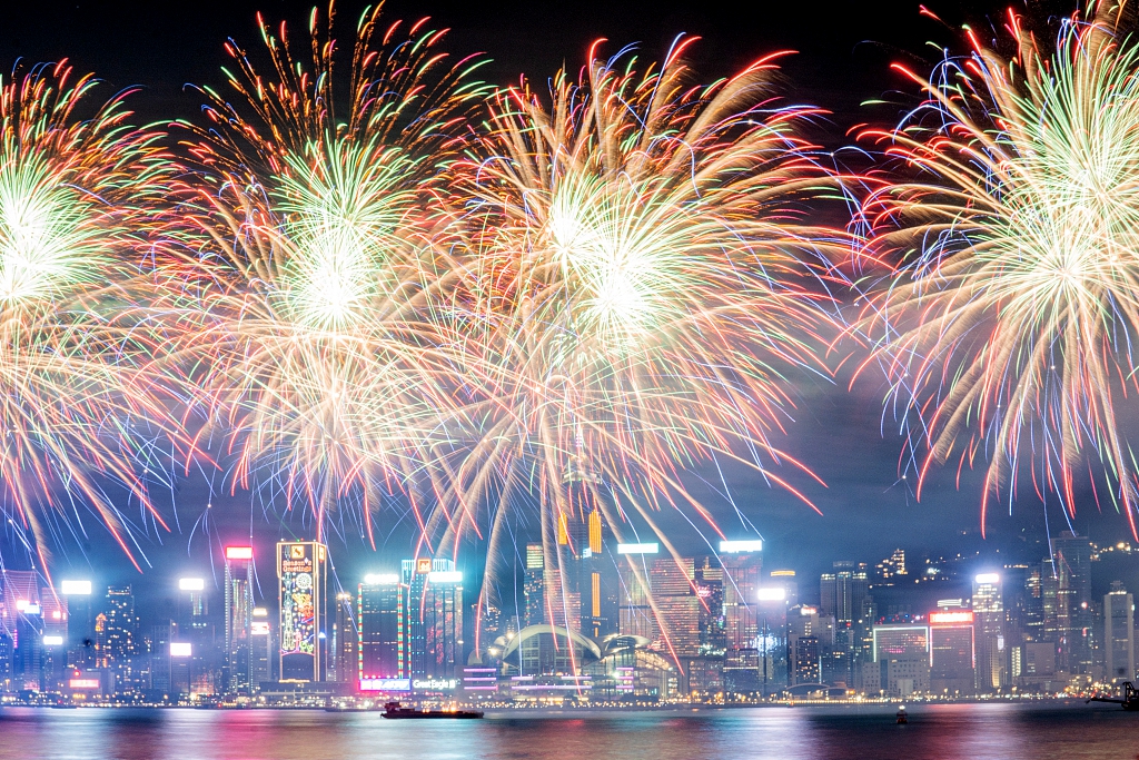 Chinese New Year fireworks light up the sky over Victoria Harbor in Hong Kong, February 11, 2024. /CFP