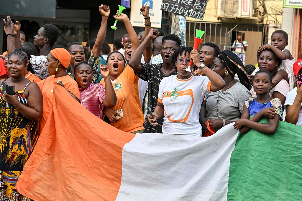 Crowds line the streets in Abidjan as Cote d'Ivoire players parade through the city to celebrate winning the African Cup of Nations title in Abidjan on February 12, 2024. /CFP
