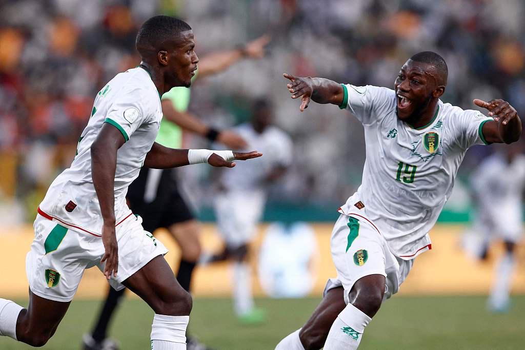 Mauritania's Sidi Bouna Amar (L) celebrates with teammate Aboubakary Koita after scoring his team's first goal during the Africa Cup of Nations group D match against Angola at Stade de la Paix in Bouake, January 20, 2024. /CFP
