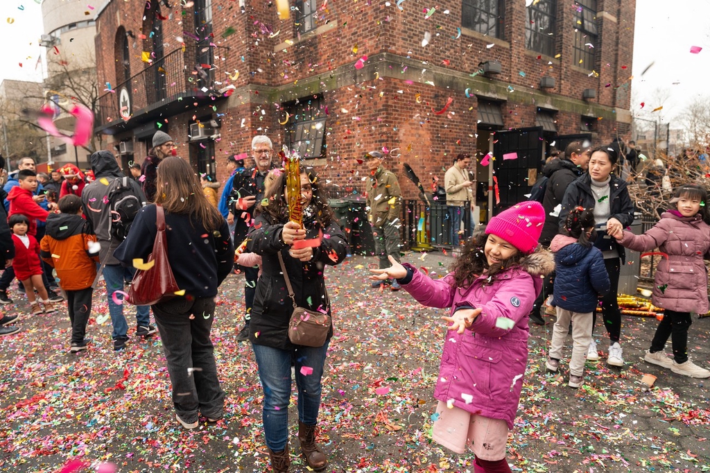 Confetti falls in the streets of Chinatown, New York City, United States, February 10, 2024. /IC