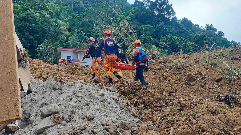 Office of the Provincial Fire Marshal workers conduct rescue operations at the site of a landslide in Maco, Davao de Oro province in the southern Philippines, February 7, 2024. /CFP