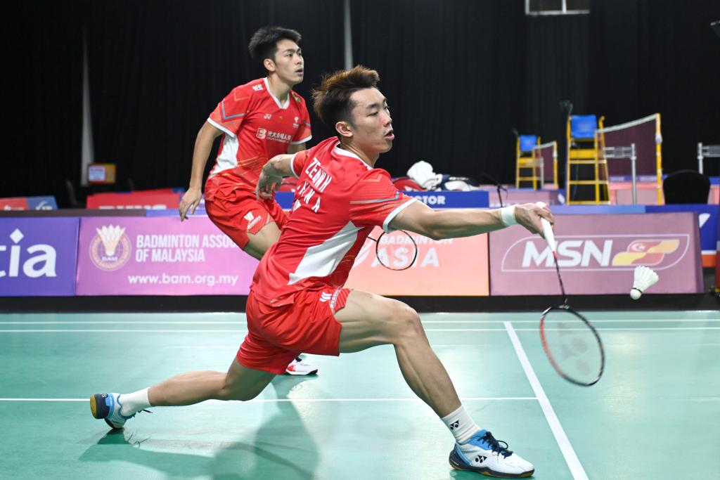 Xie Haonan/Zeng Weihan (front) of China compete against Chow Hin-long/Hung Kuei-chun of China's Hong Kong (not pictured) during their men's doubles match at the Badminton Asia Team Championships in Shah Alam, Malaysia, February 13, 2024. /Xinhua 
