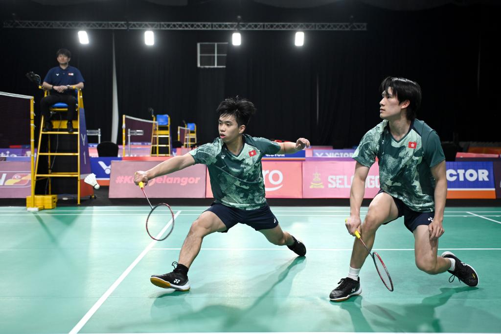 Chow Hin-long (L)/Hung Kuei-chun of China's Hong Kong in action during their men's doubles match at the Badminton Asia Team Championships in Shah Alam, Malaysia, February 13, 2024. /Xinhua
