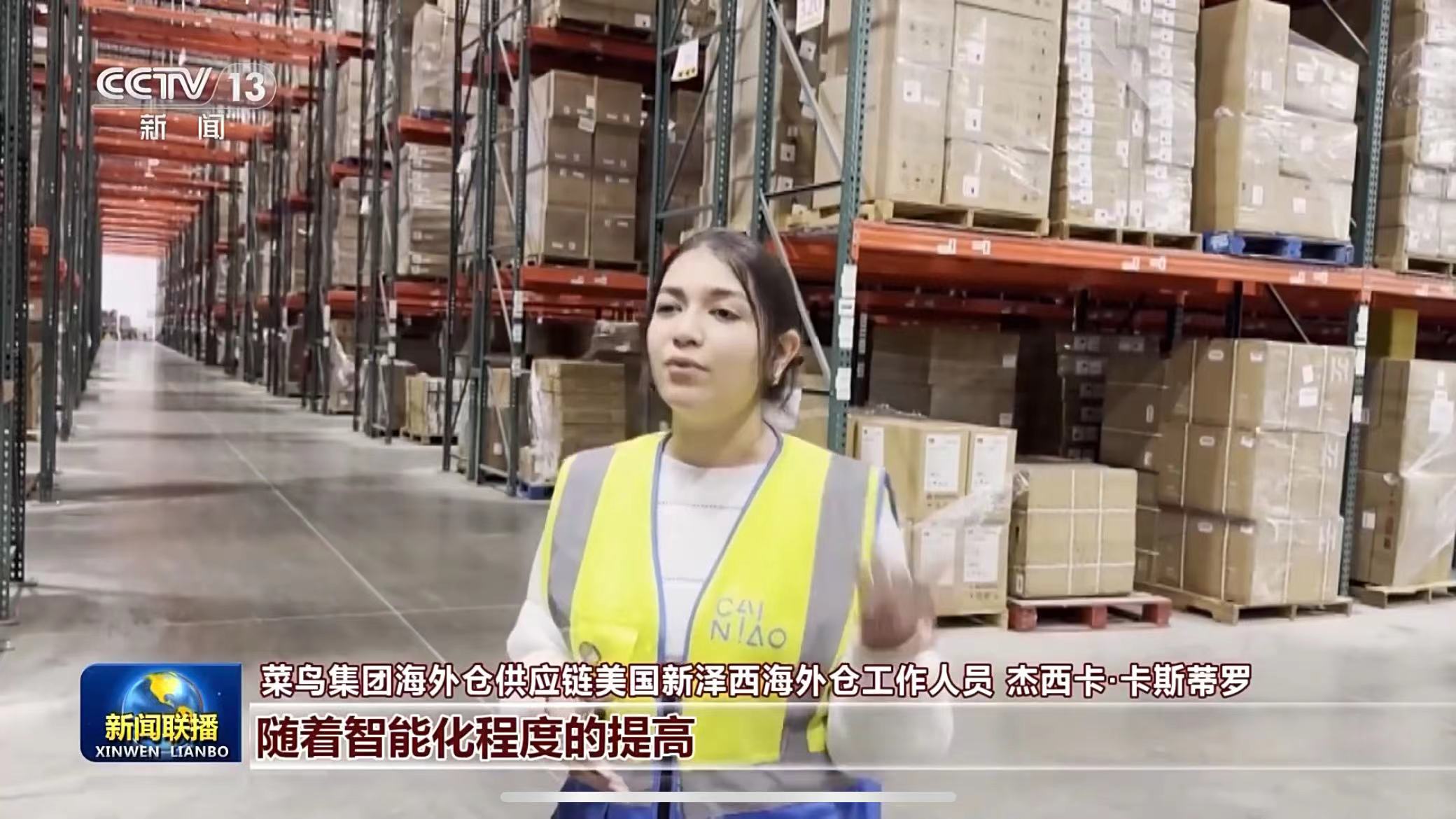 A worker at Alibaba's warehouse in New Jersey, U.S. receives an interview by China Media Group. /Screenshot from CMG