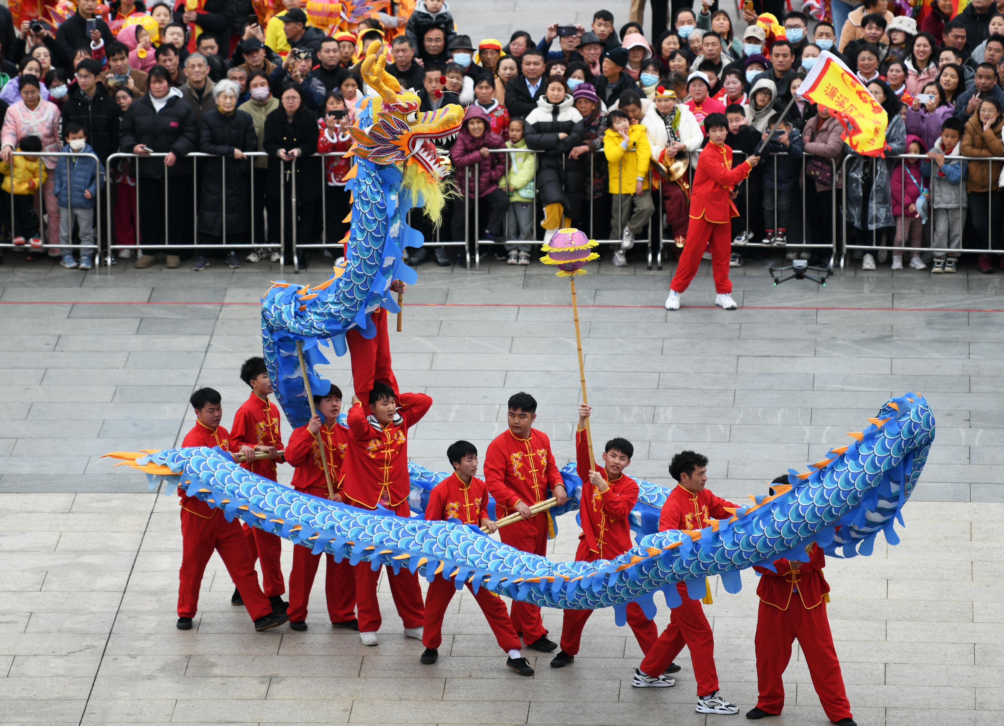 A dragon dance is seen at Nanshan Park in Jiujiang, east China's Jiangxi Province, on February 15, 2024. /IC