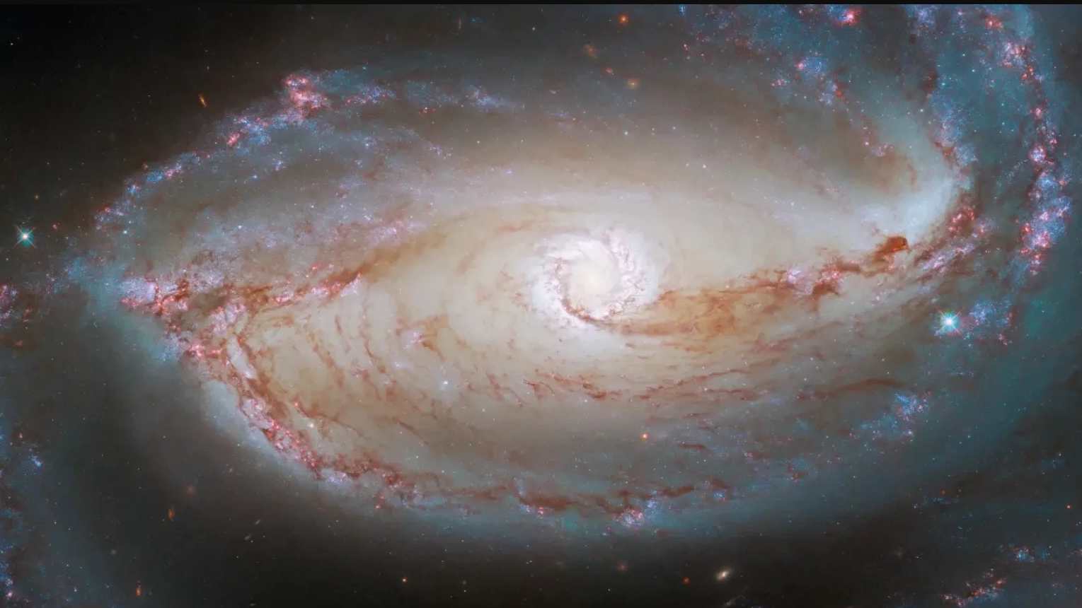 The heart of the barred spiral galaxy NGC 1097. /NASA