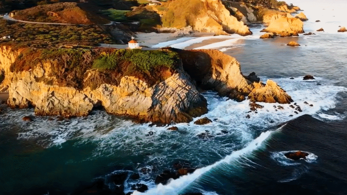 Footage generated by Sora: drone view of waves crashing against the rugged cliffs along Big Sur's garay point beach. /OpenAI