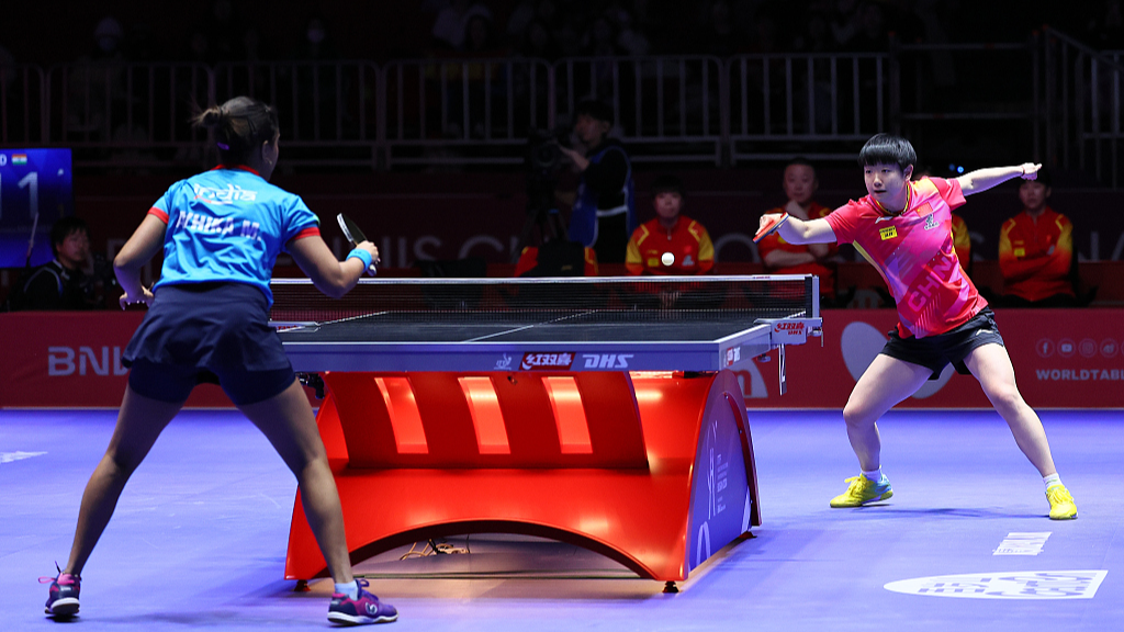 Sun Yingsha (R) and Ayhika Mukherjee in action during the ITTF World Team Table Tennis Championships Finals women's event in Busan, South Korea, February 16, 2024. /CFP