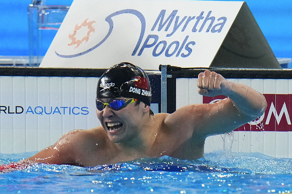 Dong Zhihao of China celebrates after winning the men's 200-meter breaststroke final at the World Aquatics Championships in Doha, Qatar, February 16, 2024. /CFP