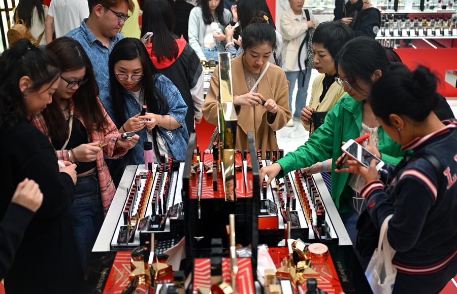 People shop at Haikou International Duty-Free Shopping Complex in Haikou, south China's Hainan Province, February 11, 2024. /Xinhua