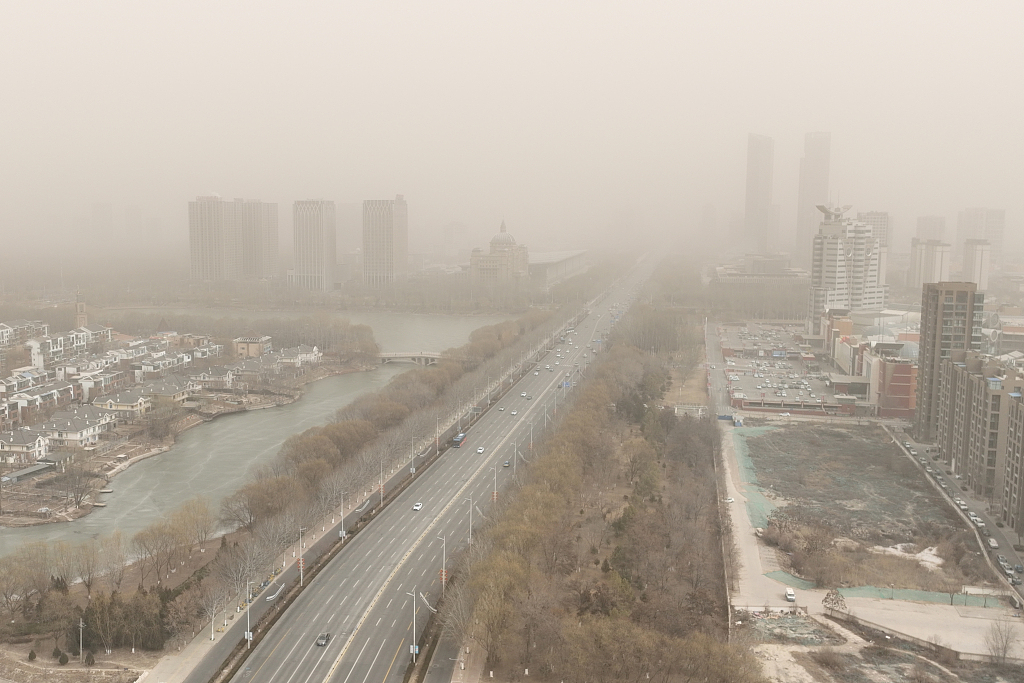 Yinchuan City of northwest China's Ningxia sees a sandstorm on February 18, 2024. /CFP