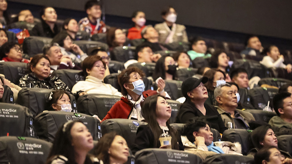 People watching movie in the cinema, in Taiyuan, Shanxi Province, February 12. /CFP
