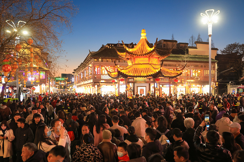 Crowd enjoying Spring Festival celebrations flocked to the Confucius Temple, Nanjing, Jiangsu Province, China, February 16, 2024. /CFP