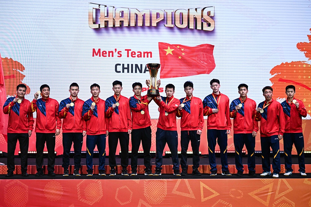 Players of Team China celebrate with the trophy after winning the men's team title during the Badminton Asia Team Championships in Shah Alam, Malaysia, February 18, 2024. /CFP