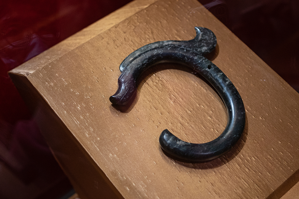 A jade dragon of Hongshan Culture is on display at the National Museum of China in Beijing on February 14, 2024. /CFP