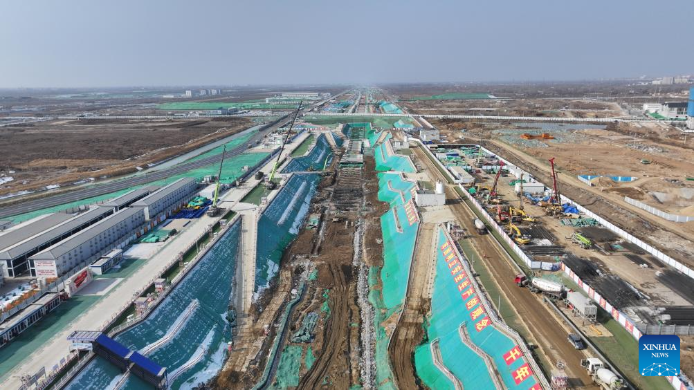 A drone photo shows the construction site of an inter-city railway station and an international trade center in Xiong'an New Area, north China's Hebei Province, Febuary 7, 2024. /Xinhua
