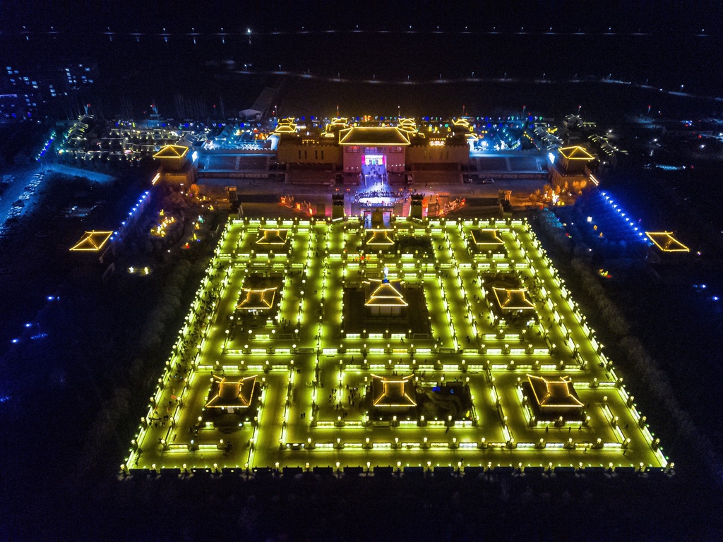 A bird's-eye view photo shows Wulan Ancient Town lit up at night in Zhangye, Gansu Province, February 19, 2024. /IC