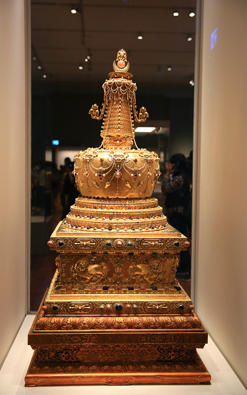 A stupa made during the Qing Dynasty from the Palace Museum collection is on display at the Hong Kong Palace Museum, Hong Kong, February 17, 2024. /CFP 