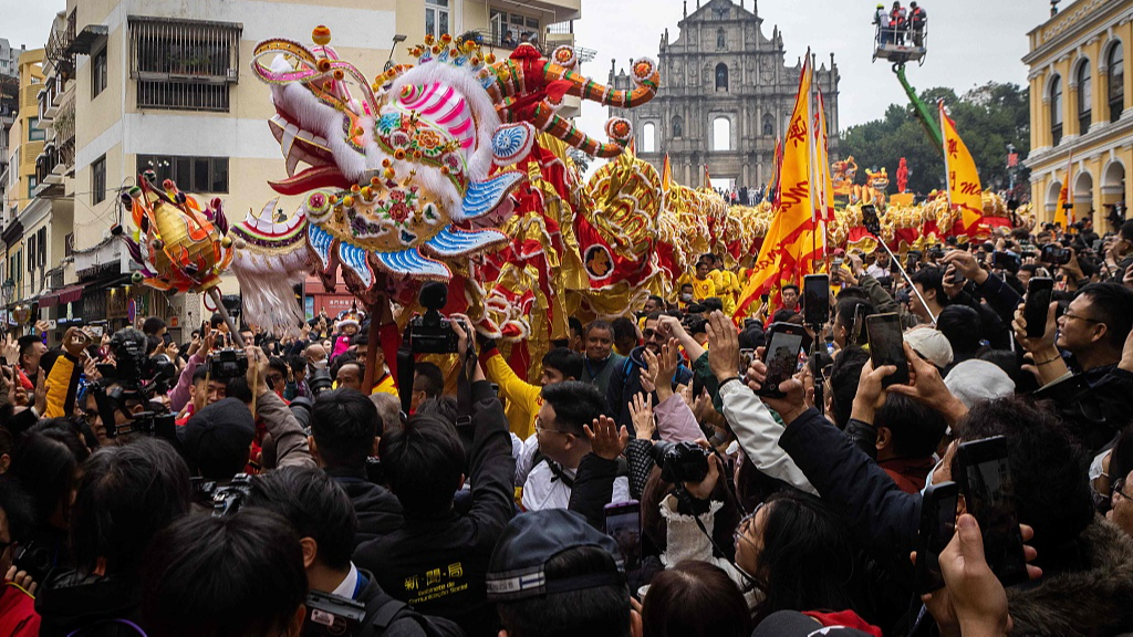 A Golden Dragon parades in front of the St. Paul's Ruins during the Lunar New Year celebrations in the Macao Special Administrative Region, south China, February 10, 2024. /CFP
