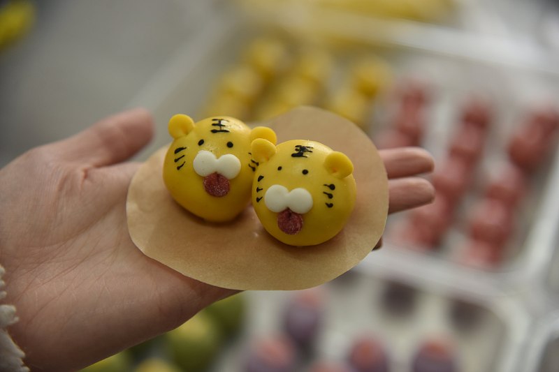 Tiger-shaped tangyuan are seen on sale at a shop in Liaocheng City, Shandong Province, February 8, 2024. /CFP