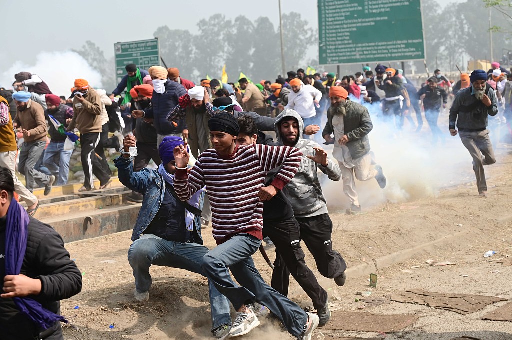 Clashes break out as police chase after protesting farmers in the border area of Punjab and Haryana states. During their 