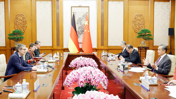 Chinese Foreign Minister Wang Yi, also a member of the Political Bureau of the Communist Party of China Central Committee, speaks during a meeting with German Chancellor's Foreign and Security Policy Advisor Jens Plotner in Beijing, China, February 23, 2024. /Chinese Foreign Ministry