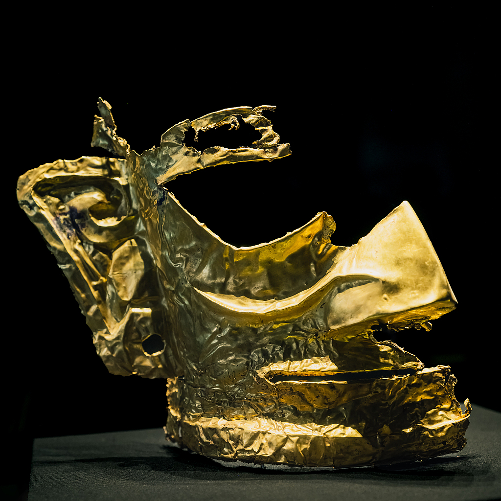 A file photo shows a gold mask unearthed from Sanxingdui site. /CFP