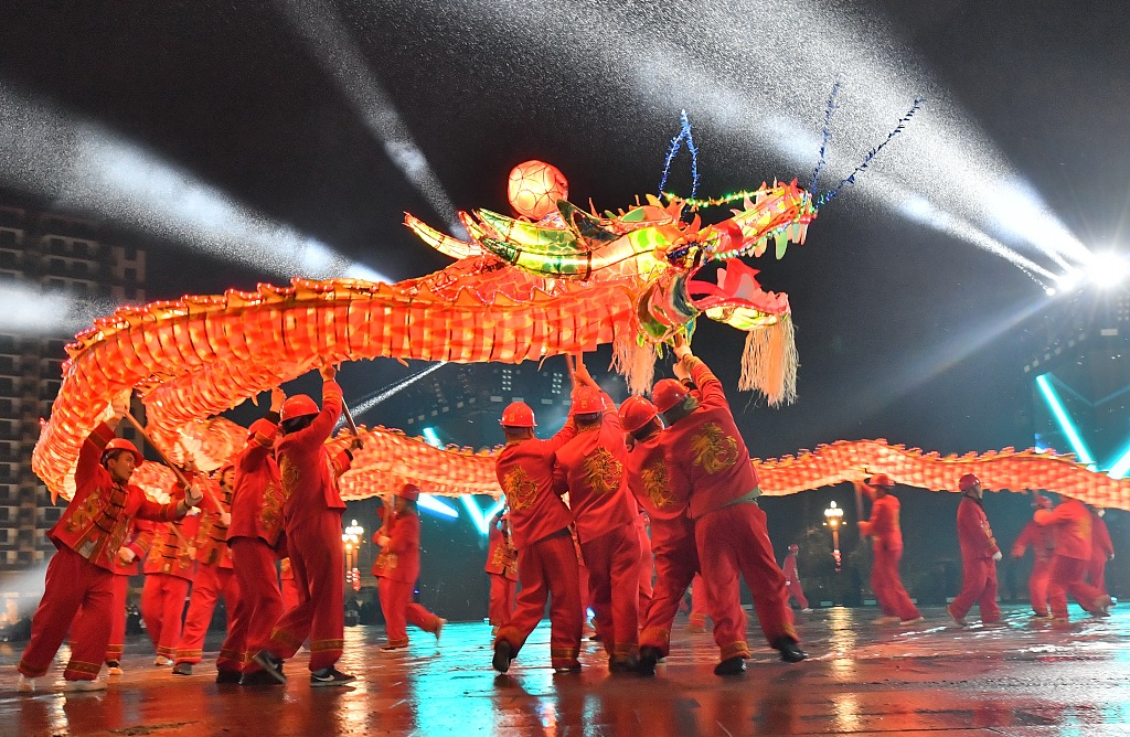 People perform Wulong Xuhua in Taijiang, southwest China's Guizhou Province, on February 23, 2024. /CFP