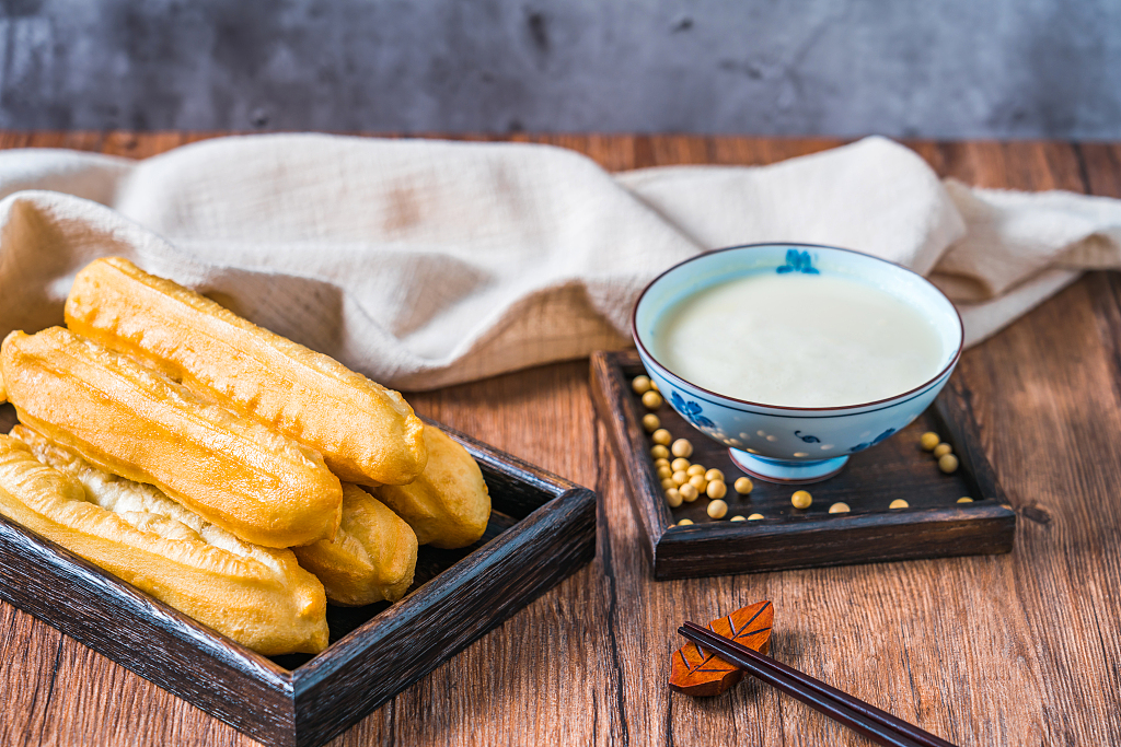 A file photo shows youtiao and a bowl of soy milk on the side. /CFP