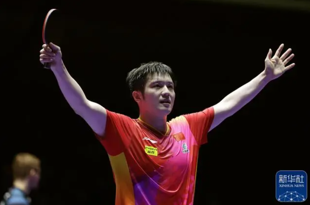 Fan Zhendong of China celebrates his victory in the ITTF World Team Table Tennis Championships Finals in Busan, South Korea, February 25, 2024. /Xinhua