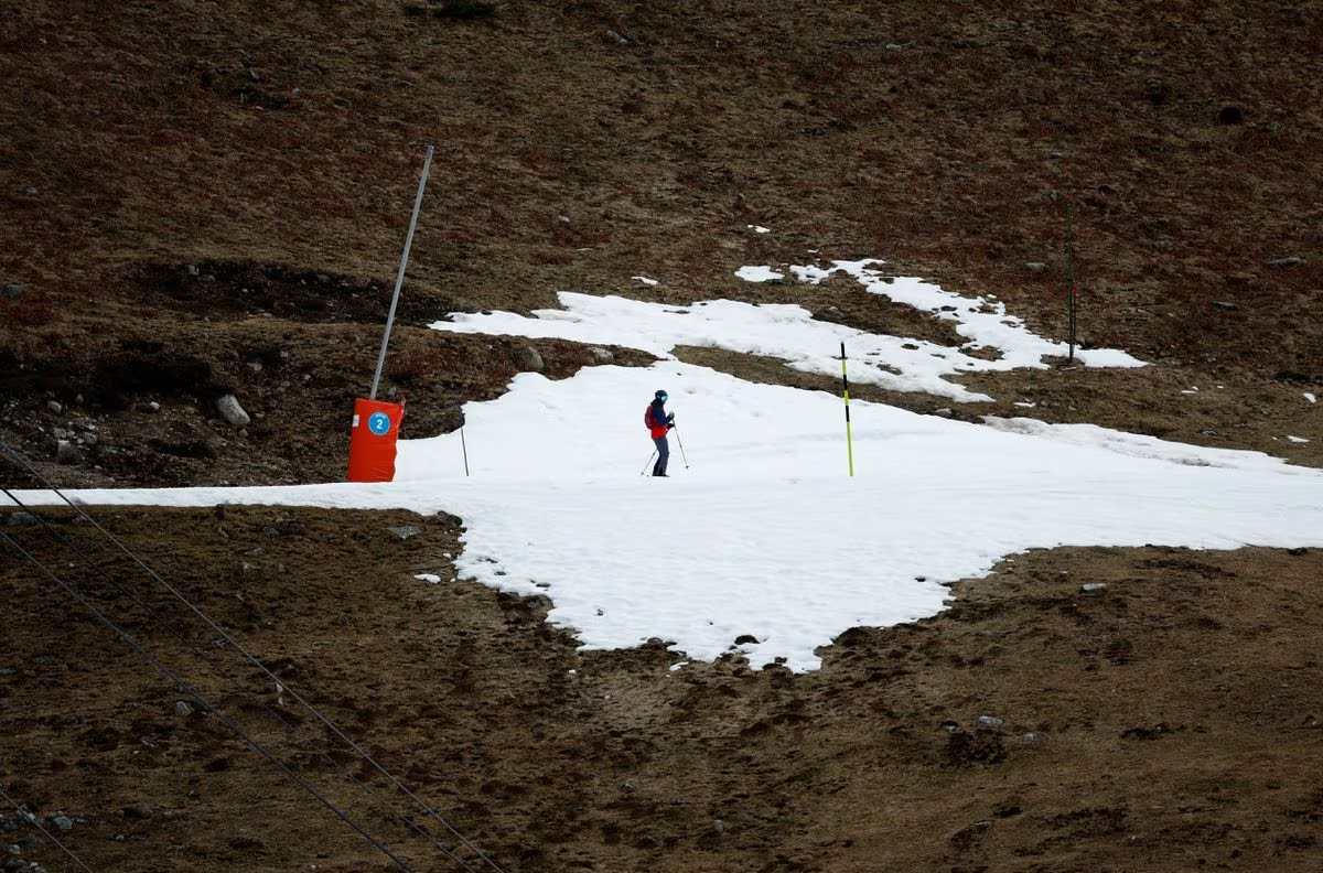 A skier passes on an artificial ski snow slope on a mild winter day in the Bareges ski resort, Hautes-Pyrenees, southwestern France, February 21, 2024. /Reuters