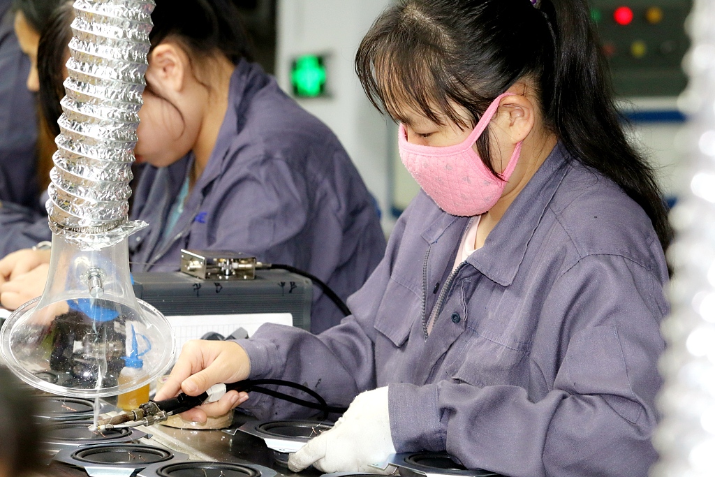 Workers on duty at a production workshop of an electronics enterprise in an industrial park in Ji'an City, east China's Jiangxi Province, February 26, 2024. /CFP