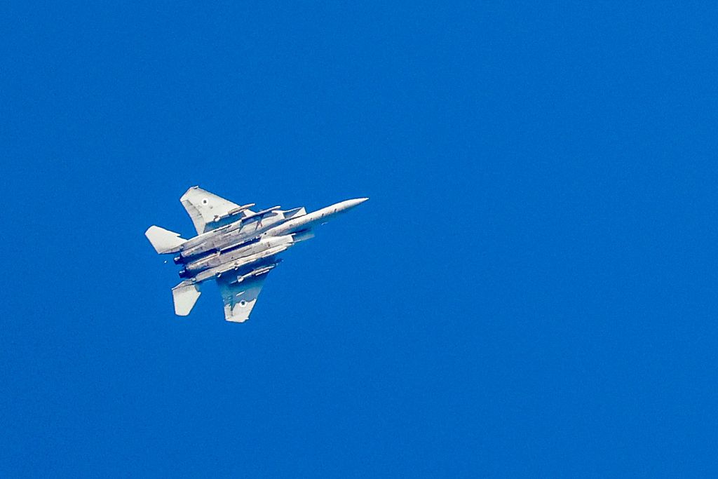 This picture taken from a position in northern Israel shows an Israeli Air Force fighter jet flying over the border area with south Lebanon amid ongoing cross-border tensions as fighting continues between Israel and Hamas militants in Gaza, February 25, 2024. /CFP