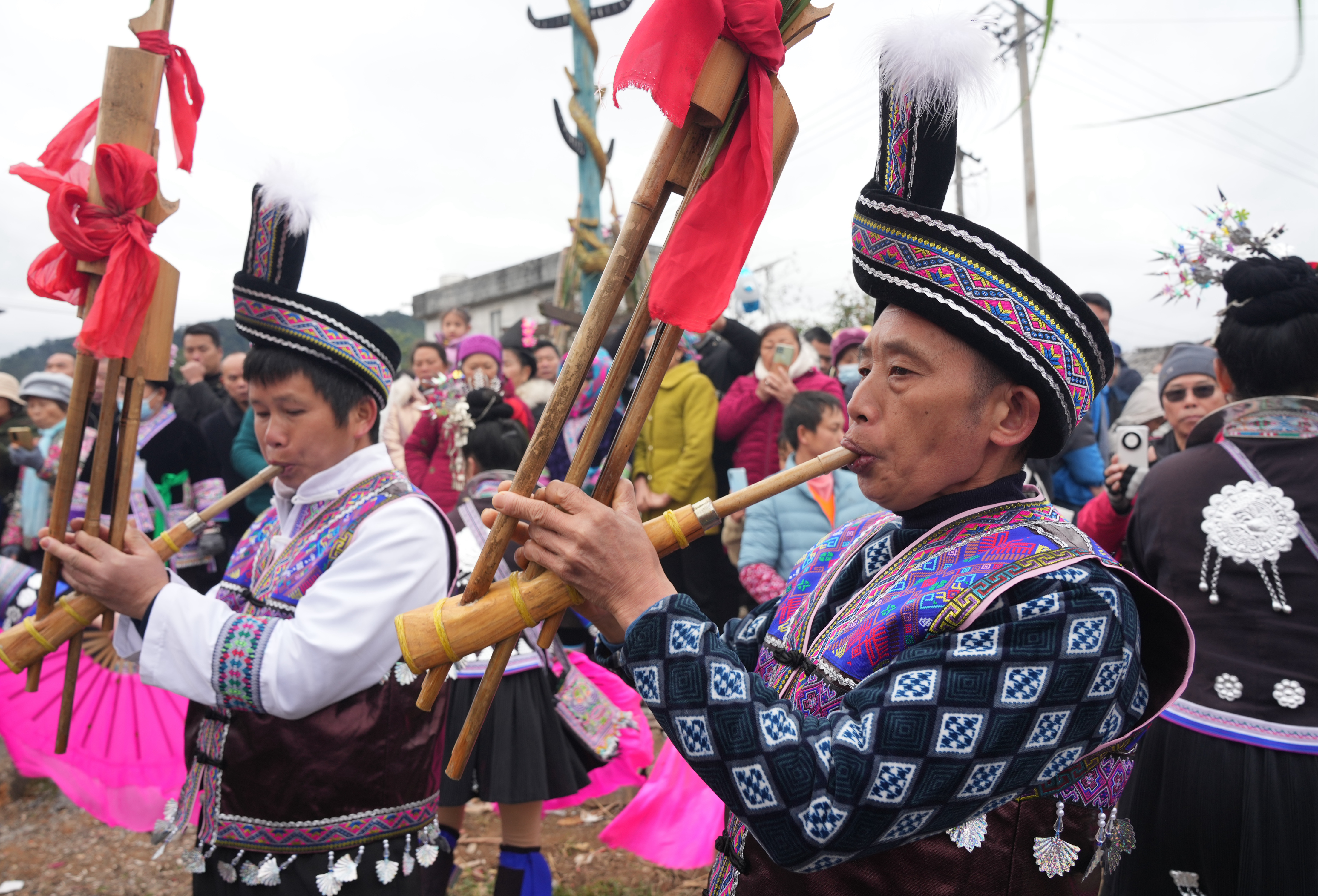 Performers play the lusheng at the Gulong Pohui Festival in Rongshui Miao Autonomous County, Liuzhou City, south China's Guangxi Zhuang Autonomous Region on February 25, 2024. /IC