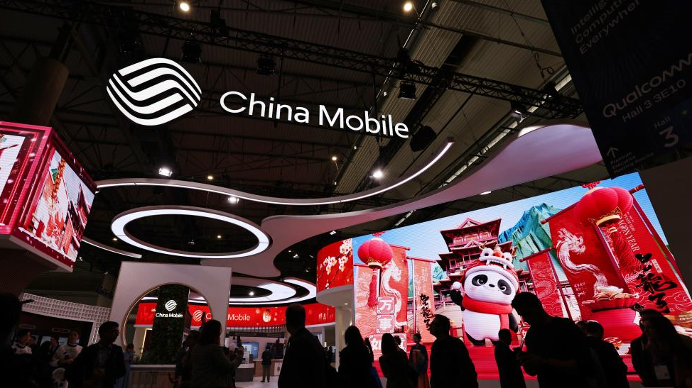 People visit the China Mobile pavilion at the 2024 edition of the Mobile World Congress (MWC) in Barcelona, Spain, February 26, 2024. /Xinhua