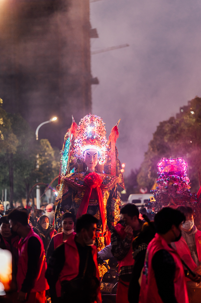 A file photo shows the headdresses of the deities decorated with LED lights, adding a festive and modern touch to the hundreds-year-old tradition. /CFP