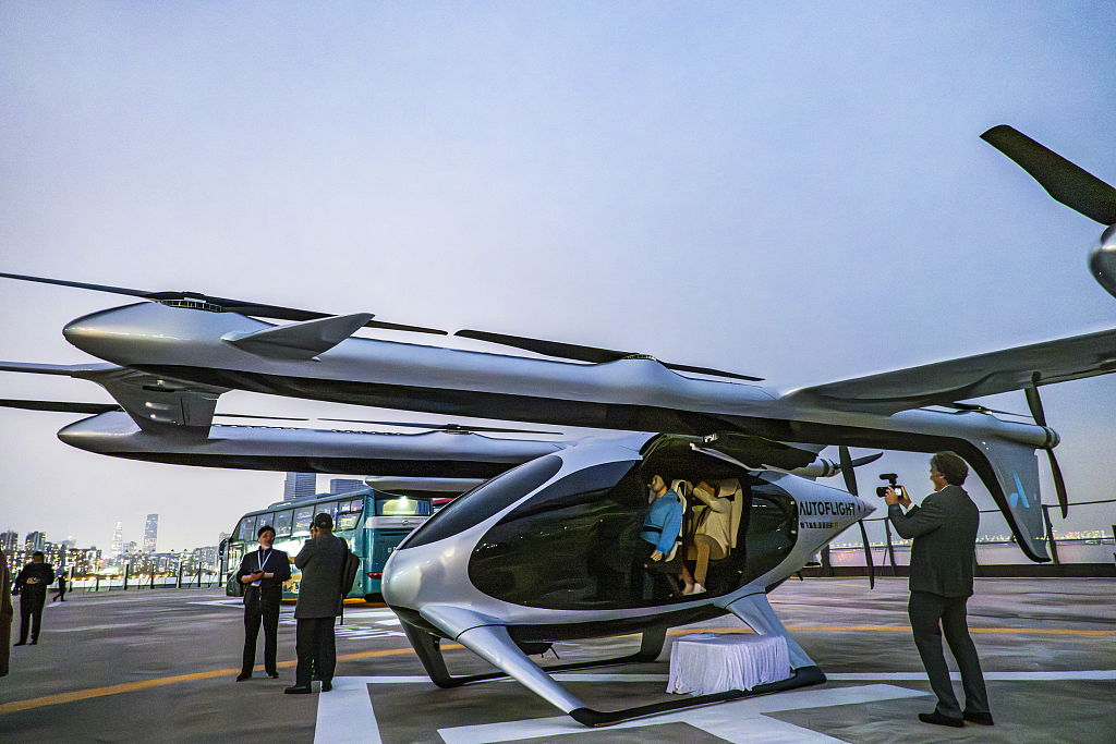An eVTOL manned aircraft is seen parked at the Shekou Cruise Terminal in Shenzhen, Guangdong Province, on February 27, 2024, ready for what is believed to be the world's first test flight. /CFP