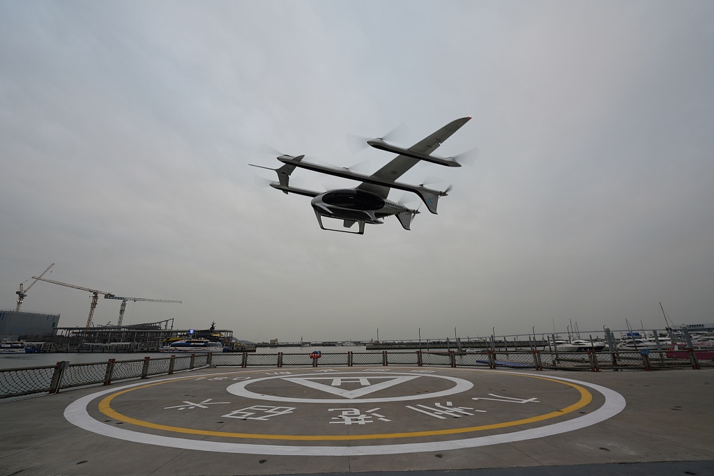 An eVTOL manned aircraft takes off on a test flight in Shenzhen, Guangdong Province, on February 27, 2024. /CFP