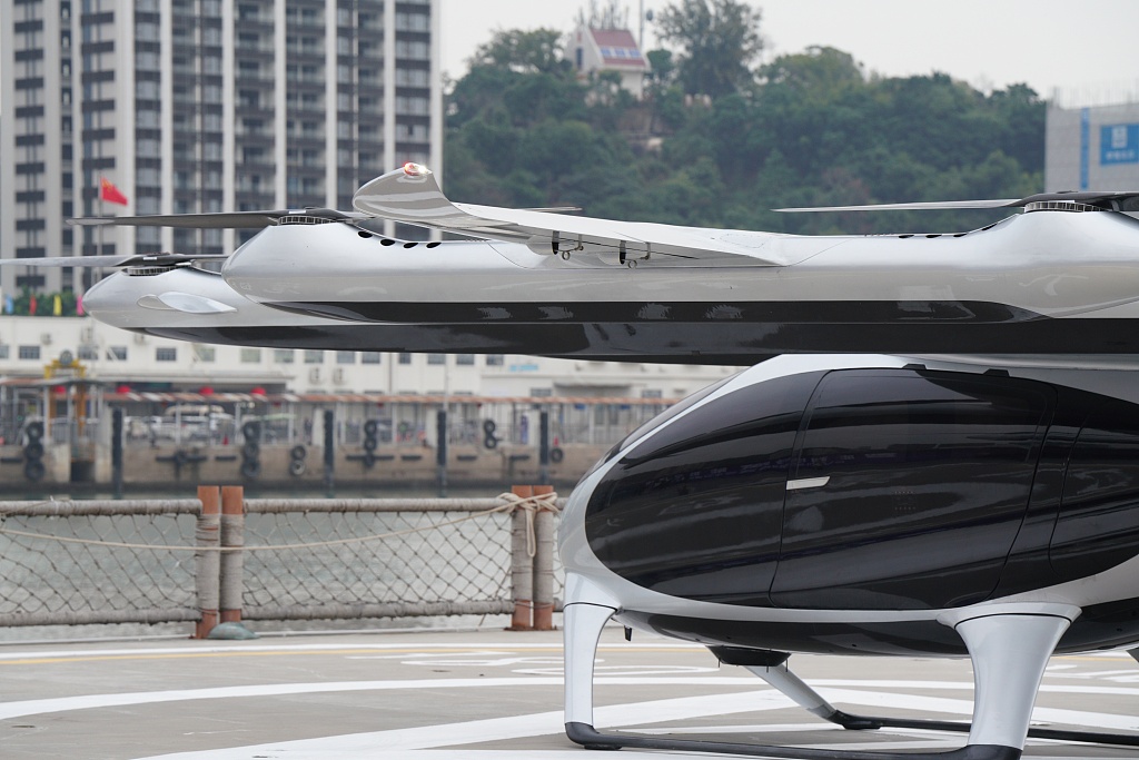 An eVTOL manned aircraft is seen parked at the Shekou Cruise Terminal in Shenzhen, Guangdong Province, on February 27, 2024, ready for what is believed to be the world's first test flight. /CFP