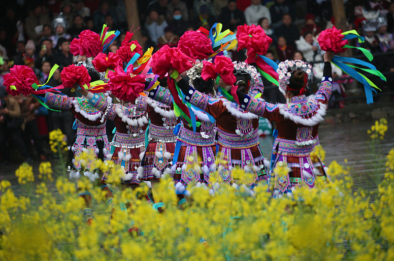 Miao people dance together to celebrate their traditional festival in Liuzhou, Guangxi Zhuang Autonomous Region, February 28, 2024. /CFP