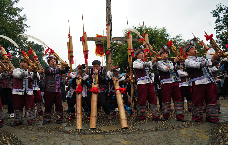 Miao people play the lusheng to celebrate their traditional festival in Liuzhou, Guangxi Zhuang Autonomous Region, February 28, 2024. /CFP