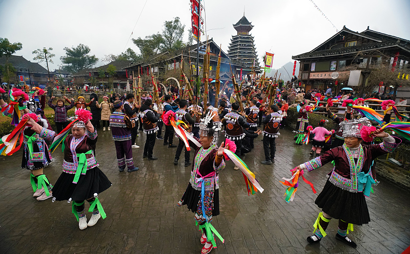Miao people dance together to celebrate their traditional festival in Liuzhou, Guangxi Zhuang Autonomous Region, February 28, 2024. /CFP