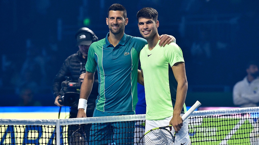 Serbia's Novak Djokovic (L) and Spain's Carlos Alcaraz Riyadh pose for a picture ahead of their Riyadh Season Tennis Cup exhibition tournament match in Riyadh, Saudi Arabia, December 27, 2023. /CFP