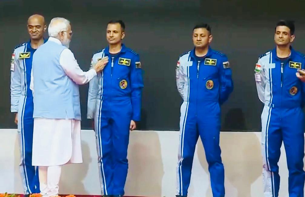 Indian Prime Minister Narendra Modi hands over wings to astronauts-designate selected to be astronauts on India's first crewed mission to space Gaganyaan mission, at the Vikram Sarabhai Space Centre (VSSC), in Thiruvananthapuram, India, February 26, 2024 / Courtesy- Indian Space Research Organisation 